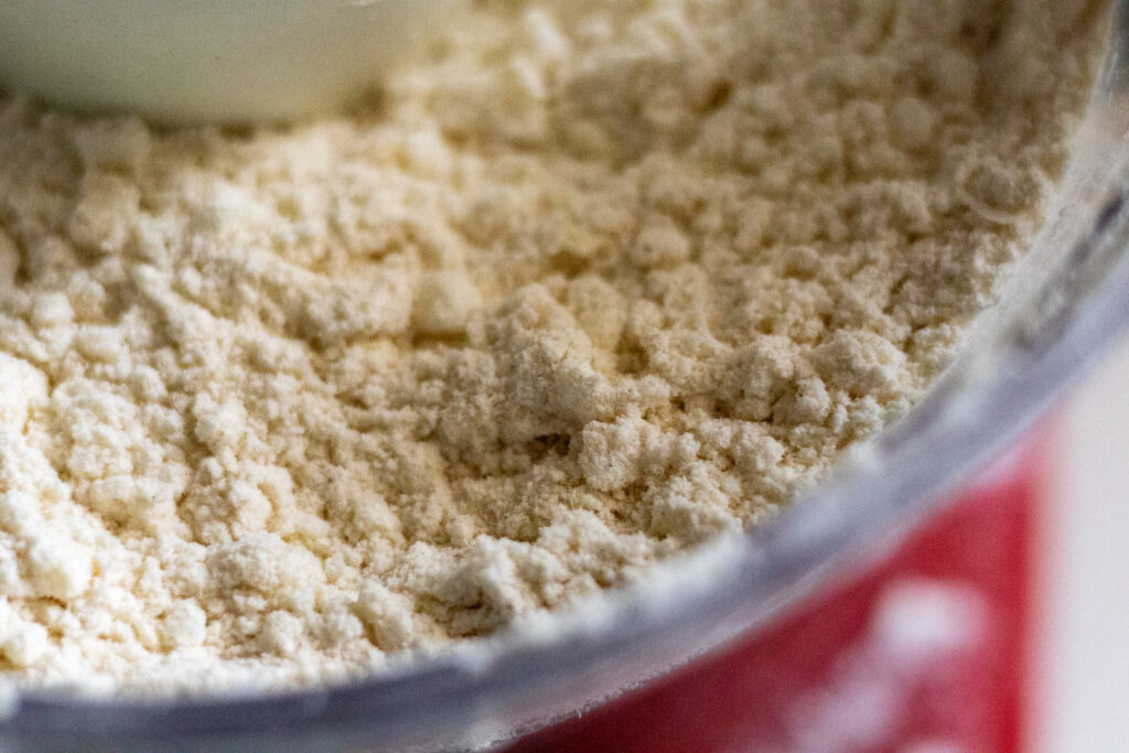 Flour and fats mixed up in food processor. 