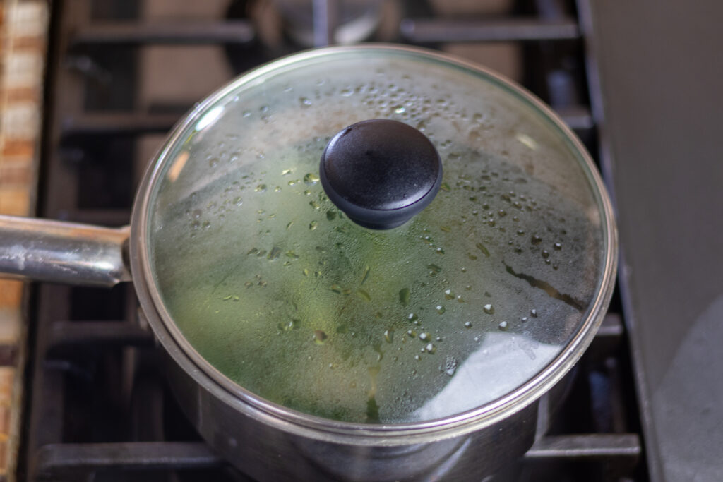 Horehound tea simmering in silver pot