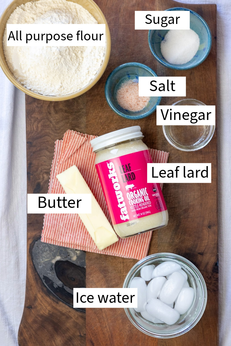A flat lay of ingredients for a lard and butter pie crust labeled.