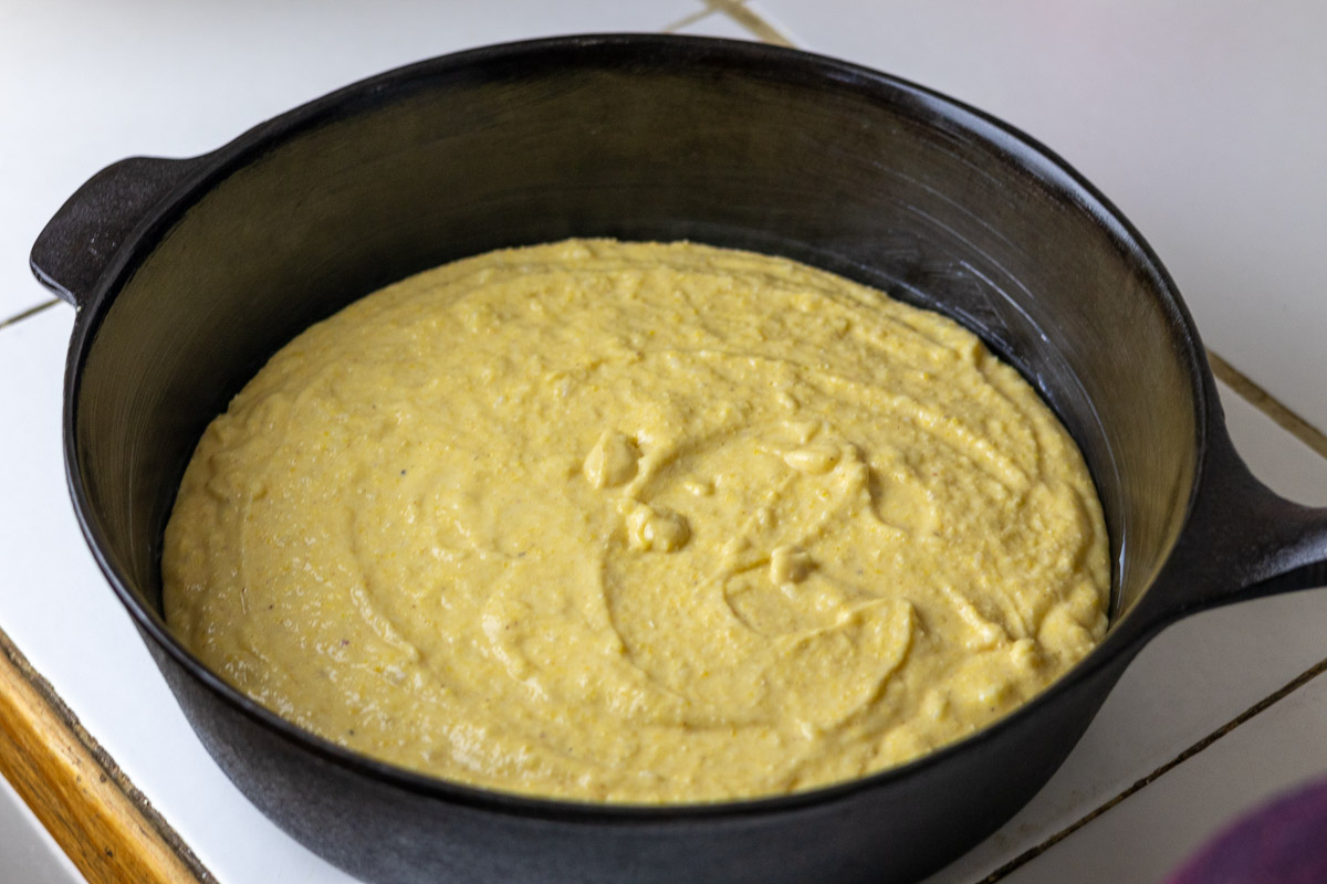 Cornbread that is gluten free and made with lard in a cast iron skillet.