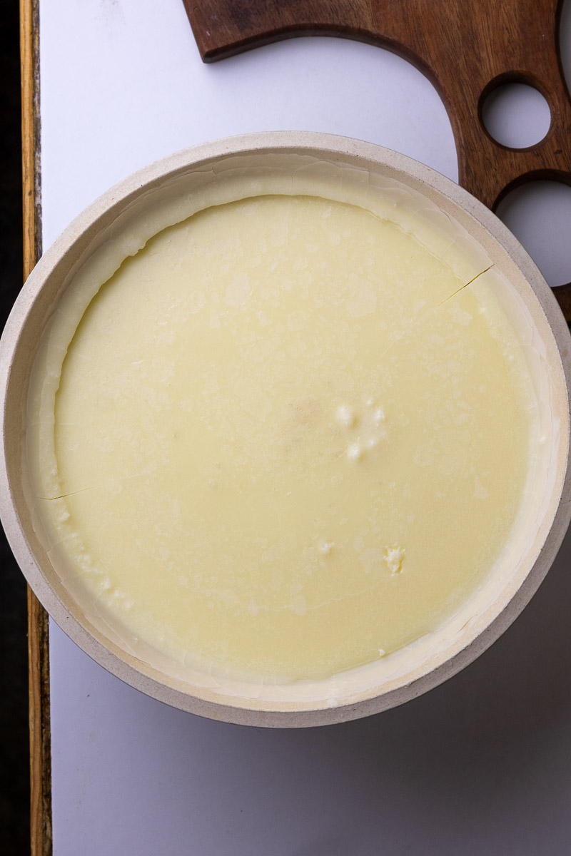 A large mixing bowl full of wet rendered tallow.