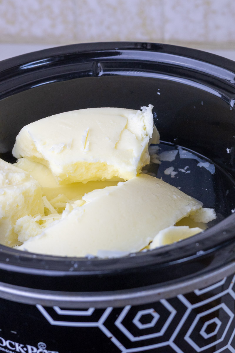 A crockpot full of rendered tallow and water, repeating the process.