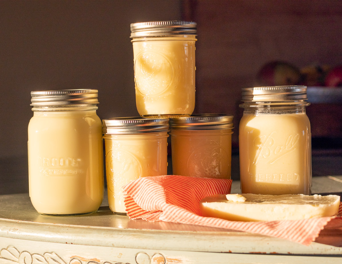 Morning light hitting jars and one block of tallow.