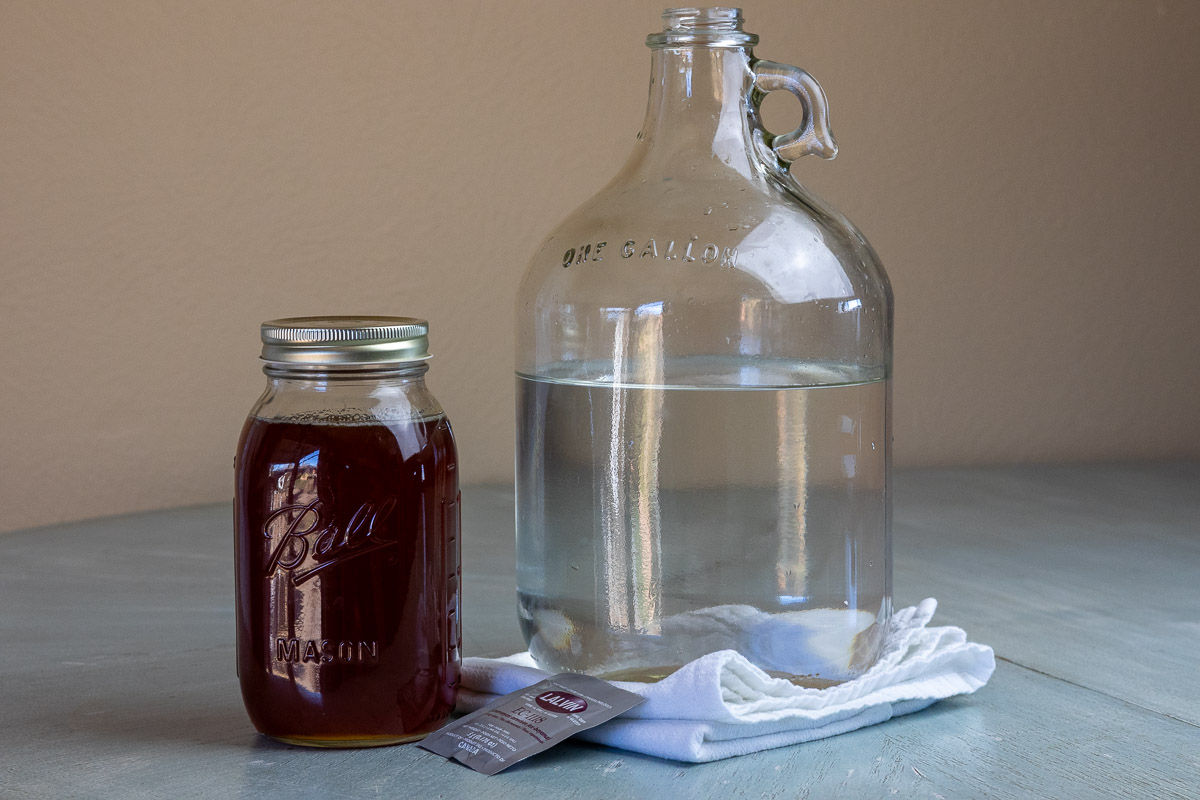 The ingredients necessary to make 1 gallon of mead. Honey, water and yeast.
